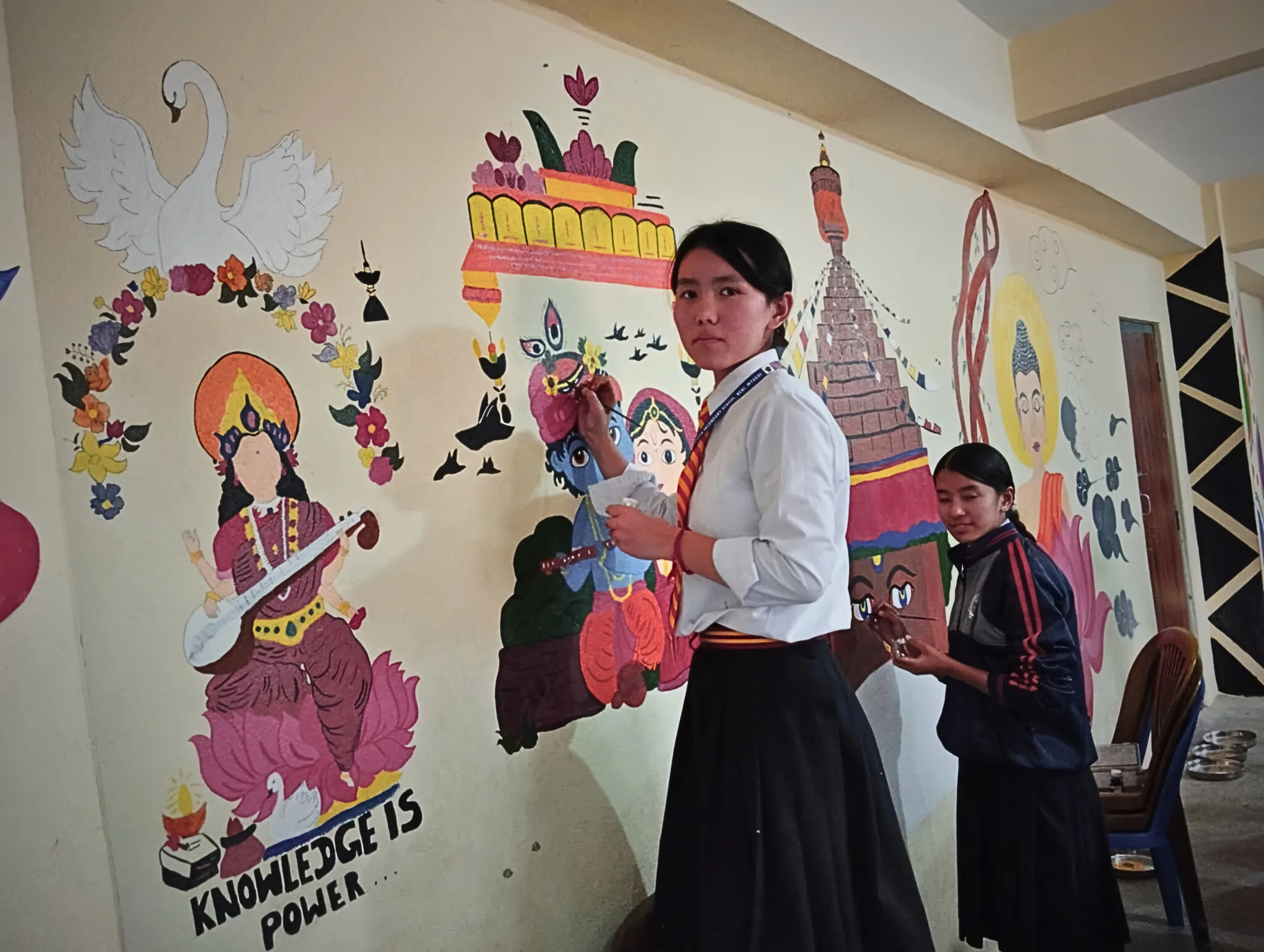 Mount Everest Secondary School Combines Art and Spirituality 1 Skillful students of Mount Everest Secondary School in Beni, Myagdi, have transformed their assembly hall with vibrant murals depicting spiritual and cultural themes. The students, Angelina Bhattachan, Rihana Thapa, Kushal Pun, Suman BK, and Anmol Chhantyal, drew inspiration from images of deitie